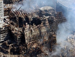  Ground Zero, New York City, N.Y. (Sept. 17, 2001) -- An aerial view shows only a small portion of the crime scene where the World Trade Center collapsed following the Sept. 11 terrorist attack. Surrounding buildings were heavily damaged by the debris and