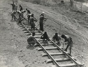 File - British East Africa - Civil Engineering, making a permanent way by laying railway tracks.