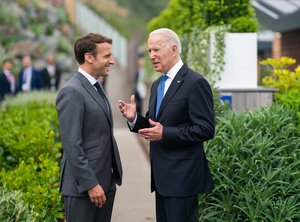 Image showing President Joe Biden and French President Emmanuel Macron talk prior to the first session of the G7 Summit on Friday, June 11, 2021, at the Carbis Bay Hotel and Estate in St. Ives, Cornwall, England.