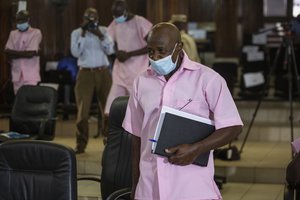 In this Friday, Feb. 26, 2021 file photo, Paul Rusesabagina, who inspired the film "Hotel Rwanda" and is credited with saving more than 1,000 people by sheltering them at the hotel he managed during the genocide, attends a court hearing in Kigali, Rwanda