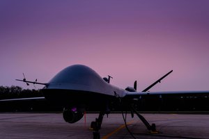 A U.S. Air Force MQ-9 Reaper drone from the Arizona Air National Guard 214th Attack Group parked on the flightline at the Alpena Combat Readiness Training Center, Mich. as its crew prepares to participate in the Northern Strike exercise on August 5, 2021.