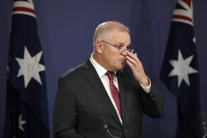 Australia's Prime Minister Scott Morrison attends a press conference in Sydney, Australia, on April 27, 2021