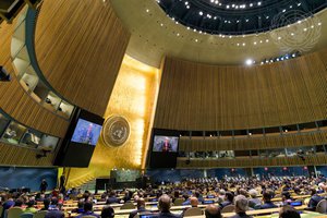 A wide view of the General Assembly Hall as Secretary-General António Guterres (at podium and on screens) addresses the general debate of the General Assembly’s seventy-sixth session, 9 September, 2021.