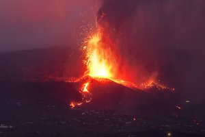 Lava from a volcano eruption flows on the island of La Palma in the Canaries, Spain, Tuesday, Sept. 21, 2021