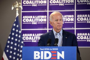 Former Vice President of the United States Joe Biden speaking with supporters at a town hall hosted by the Iowa Asian and Latino Coalition at Plumbers and Steamfitters Local 33 in Des Moines, Iowa