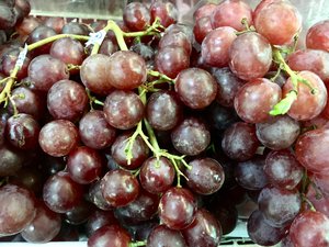 Ripe grapes on display at a fruit market. Taken on March 2018.