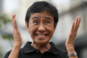 Rappler CEO and Executive Editor Maria Ressa reacts during an interview at a restaurant in Taguig city, Philippines on Saturday, Oct. 9, 2021.