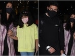 Aishwarya Rai Bachchan with her husband Abhishek Bachchan and their daughter Aaradhya arrived in Mumbai from Paris today. The couple was snapped at the airport early in the morning. They came to Mumbai right in time for Amitabh Bachchan's 79th birthday.(HT Photo/Varinder Chawla)