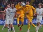 Wales' midfielder Aaron Ramsey (C) and Czech Republic's defender Filip Novak vie for the ball. (Getty)