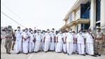 Leader of Opposition in the Tamil Nadu legislative assembly Edapaddi K. Palaniswami walks out with AIADMK MLAs sporting black badges over NEET suicides during the Budget Session at Kalaivanar Arangam in Chennai on September 13. (PTI)