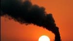 Smoke billows from a power station during sunset in New Delhi in this February 16, 2005 file photo. (File photo)