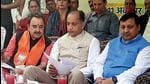 Himachal chief minister Jai Ram Thakur and BJP’s Arki candidate Ratan Pal Singh during an election campaign on Monday. (HT Photo)