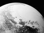 A synthetic perspective view of Pluto, based on high-resolution images from Nasa's New Horizons spacecraft.(Reuters Photo)