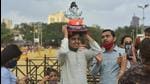 As per BMC regulations, not more than ten people are allowed at the time of immersion of public Ganesh idols, and not more than five people are allowed at the time of immersion of household Ganesh idols in Mumbai this year. (Anshuman Poyrekar/HT PHOTO)