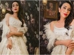 Karisma Kapoor transforms into a modern bride in white chikankari lehenga and bold red lips(Instagram/@eshaamiin1)