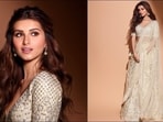 Tara Sutaria flaunts understated elegance in Anita Dongre's muted gold lehenga(Instagram/tarasutaria/anitadongre)