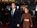 Actors Ben Affleck and Jennifer Lopez walked hand in hand as they arrived for the premiere of The Last Duel at Rose Theater at Jazz in New York on Saturday. (Photo by Evan Agostini/Invision/AP)(Evan Agostini/Invision/AP)