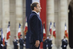 French President Emmanuel Macron attends a national memorial ceremony for Hubert Germain at the Hotel des Invalides, Friday Oct.15, 2021 in Paris, Hubert Germain, the last of an elite group of decorated French Resistance fighters who helped liberate France from Nazi control in World War II, has died. He was 101.