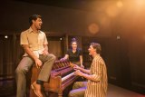 The cast of Merrily We Roll Along -  Andrew Coshan (piano) Elise McCann, Ainsley Melham with director Dean Bryant - rehearsing Thursday’s opening 