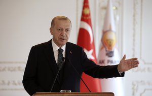 Turkey's President Recep Tayyip Erdogan speaks virtually to ruling party members from his Vahdettin Pavilion, in Istanbul, Sunday, Nov. 22, 2020.