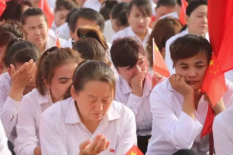 Ten thousand teachers in Hotan take part in a mass oath in Keriye County. 