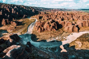 Enjoy flyovers of iconic Australian sites like the Bungle Bungle Range.