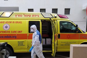 A worker of Magen David Adom wearing protective gear during COVID-19 pandemic in Israel