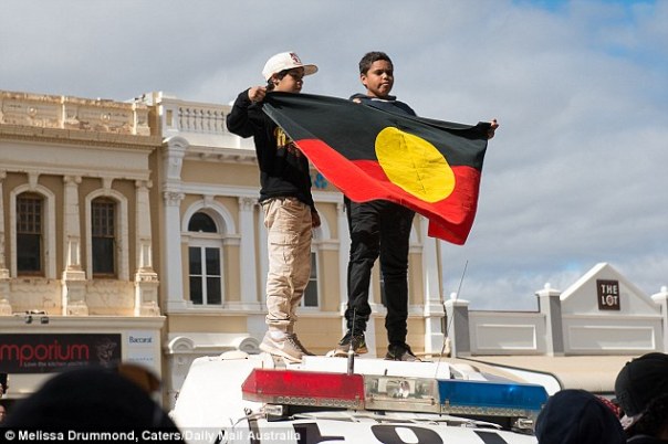 Elijah Doughty cop car flag