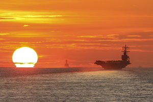 File - The USS Ronald Reagan, the USS Halsey and the USS Shiloh transit the South China Sea, June 18, 2021.