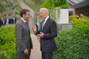 French President Emmanuel Macron and US President Joe Biden stand together, ready to take on the toughest challenges they  face; 47th G7 summit, United Kingdom, June 2021,