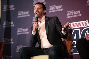 Donald Trump, Jr. speaking with attendees at the Four More Tour at the Crowne Plaza Phoenix Chandler Golf Resort in Chandler, Arizona