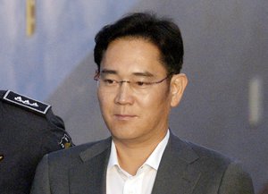 Lee Jae-yong, vice chairman of Samsung Electronics Co., arrives for his trial at the Seoul Central District Court in Seoul, South Korea, Friday, April 7, 2017.