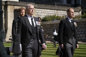 Prince Andrew, centre, Prince Harry and Prince Edward, in the procession ahead of Britain Prince Philip's funeral at Windsor Castle, Windsor, England, Saturday April 17, 2021