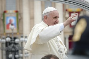 Pope Francis celebrates a canonization Mass of Saint John XXIII and Saint John Paul II