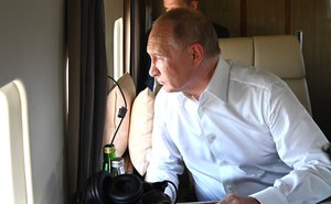 File - Vladimir Putin flew by helicopter over Chelyabinsk Region territories affected by wildfires, after which he held a meeting at Magnitogorsk airport on the situation with the floods and wildfires in the regions of the Russian Federation and the advancement of relief efforts, 6 August, 2021.