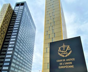 File - A view of the Towers B and C of the European Union Palais de la Cour de Justice of the CJEU (EU Court of Justice), with a sign displaying the emblem of the EU institution in the foreground.