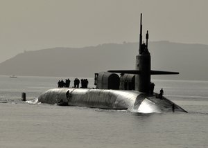 File - The guided missile nuclear submarine USS Florida (SSGN 728) arrives in Souda Bay, Greece, May 21, 2013, for a scheduled port visit.