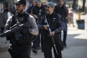 Police conduct an operation against alleged drug traffickers in the Jacarezinho favela of Rio de Janeiro, Brazil, Thursday, May 6, 2021