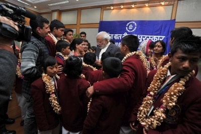 PM Modi with the winners of the National Awards for Bravery 2014