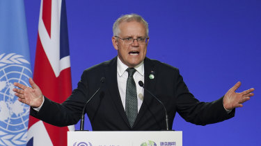 Scott Morrison, Prime Minister of Australia delivers an address, during the COP26 Summit, at the SECC in Glasgow, Scotland, Monday, Nov. 1, 2021. (Ian Forsyth/Pool Photo via AP)