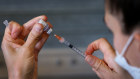 A nurse prepares the Pfizer vaccine. 