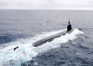 USS Connecticut (SSN 22) steams through the Pacific Ocean following the break-up of a 26 ship formation photo exercise