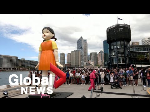 Halloween 2021: Giant “Squid Game” doll brings out thousands in Sydney