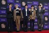 Members of South Korean K-Pop group NU'EST pose for photos during the Golden Disk Awards in Seoul, South Korea, Sunday, Jan. 5, 2020.