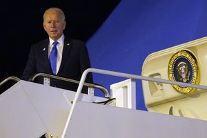 President Joe Biden boards Air Force One at Edinburgh Airport after attending the UN Climate Change Conference COP26, Tuesday, Nov. 2, 2021, in Edinburgh, Scotland.