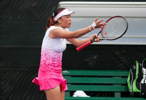 Shuai Peng (CHN) competes against Monica Niculescu (ROU) at the 2016 Miami Open presented by Itau in Key Biscayne, Florida. Photographer Aaron Gilbert