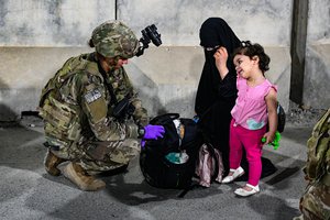 File - Paratroopers facilitate the safe evacuation of U.S. citizens, Special Immigrant Visa applicants, and other at-risk Afghans out of Afghanistan as quickly and safely as possible from Hamid Karzai International Airport in Kabul, Aug 22, 2021.