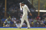 James Pattinson heads down to fine leg after an over. 