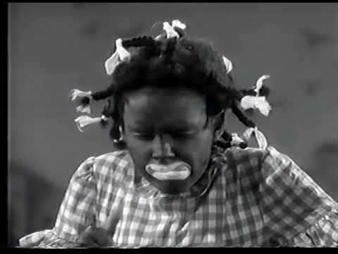 Judy Garland in blackface in  Everybody Sing  1938