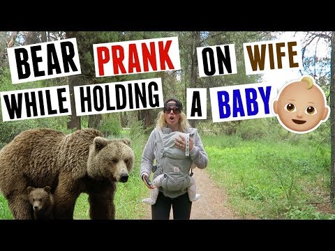 BEAR PRANK ON WIFE WHILE HOLDING A BABY